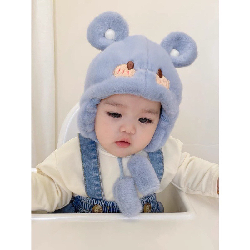 Mũ đội chùm tai giữ ấm cho bé xinh xắn