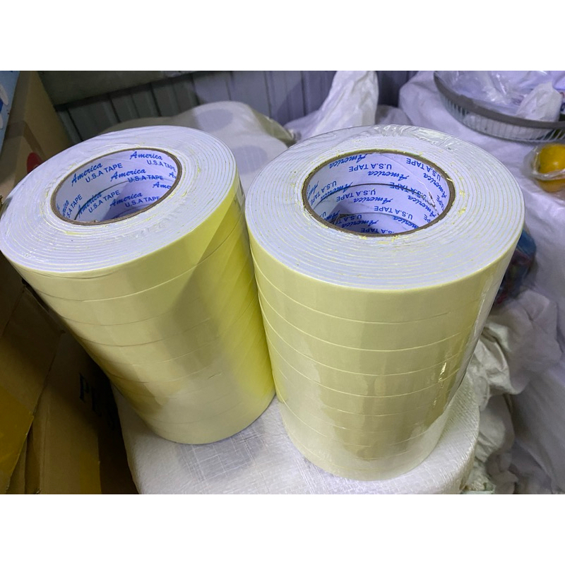 Băng keo xốp vàng trắng 2,4cm. 4,8cm- 6m dùng dán tường hay dán lên gạch độ dính cao.