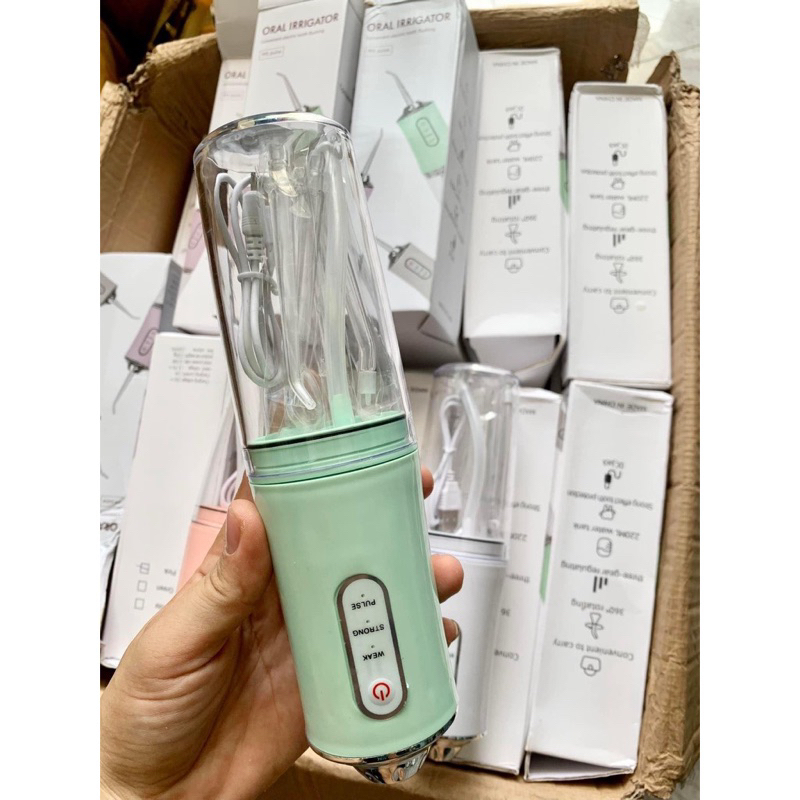 Tăm nước cầm tay du lịch Oral Irrigator