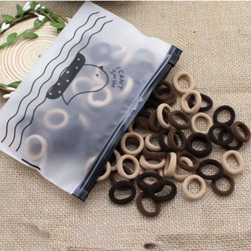 Combo 100 dây thun nhỏ cho bé buộc tóc kèm túi nhựa nhiều màu co giãn giá rẻ CB06