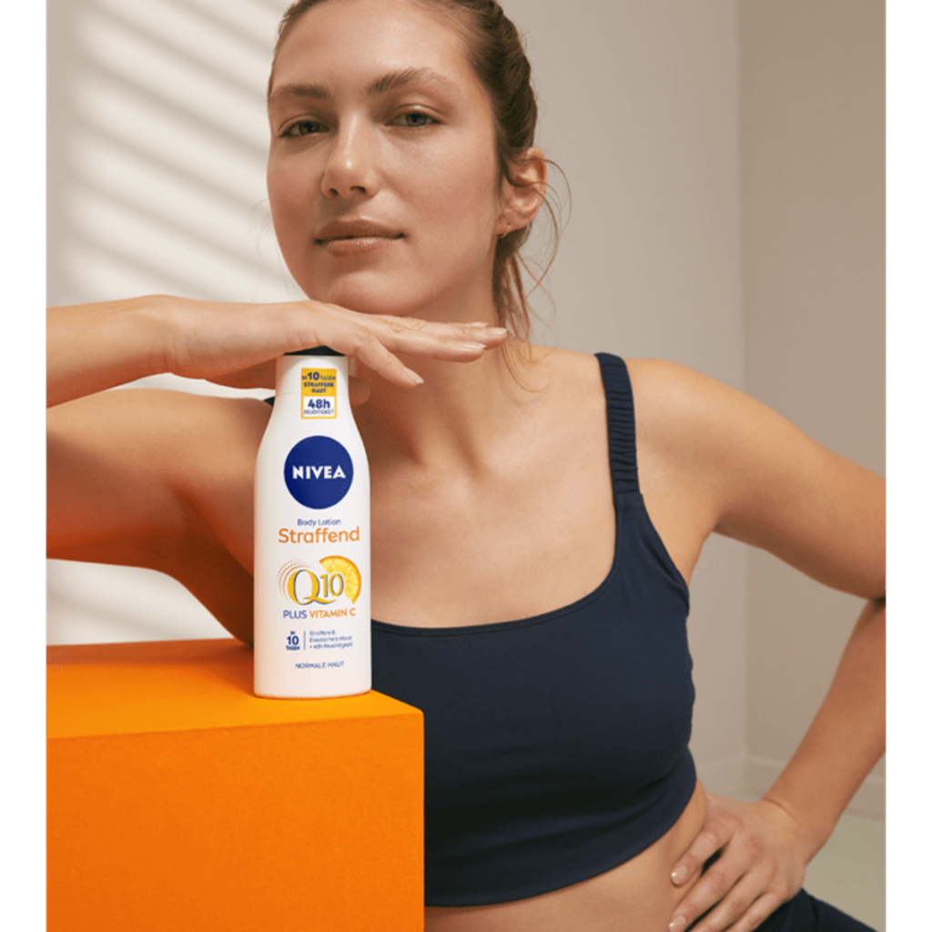 Sữa dưỡng thể ngăn ngừa lão hóa da Nivea Q10 Body Milk Plus Vitamin C 400ml
