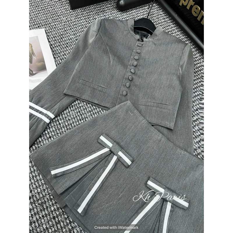 Set vest khuy bọc kèm chân váy nơ