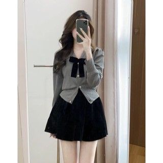 Set áo thun tăm viền khuy vàng kèm chân váy xếp ly có quần bảo hộ xixeoshop - S105