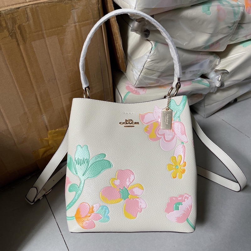 Túi xách dáng bucket hoa nổi
