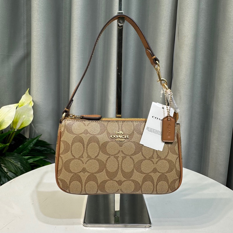 Túi Coach Nolita thuyền kẹp nách xuất chuẩn