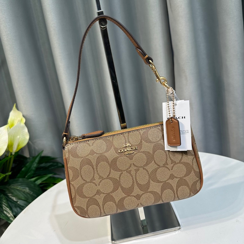Túi Coach Nolita thuyền kẹp nách xuất chuẩn