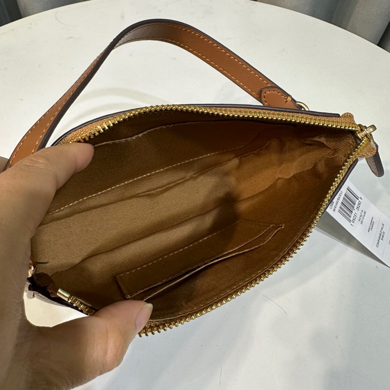 Túi Coach Nolita thuyền kẹp nách xuất chuẩn