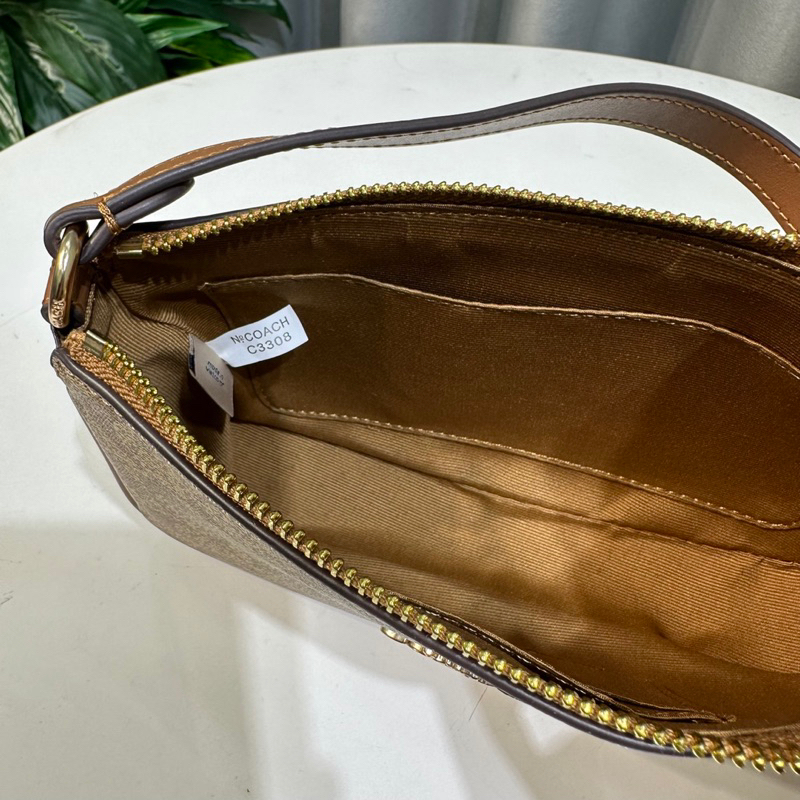 Túi Coach Nolita thuyền kẹp nách xuất chuẩn