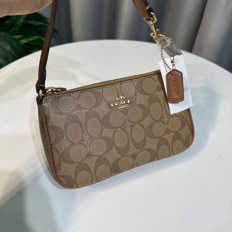 Túi Coach Nolita thuyền kẹp nách xuất chuẩn