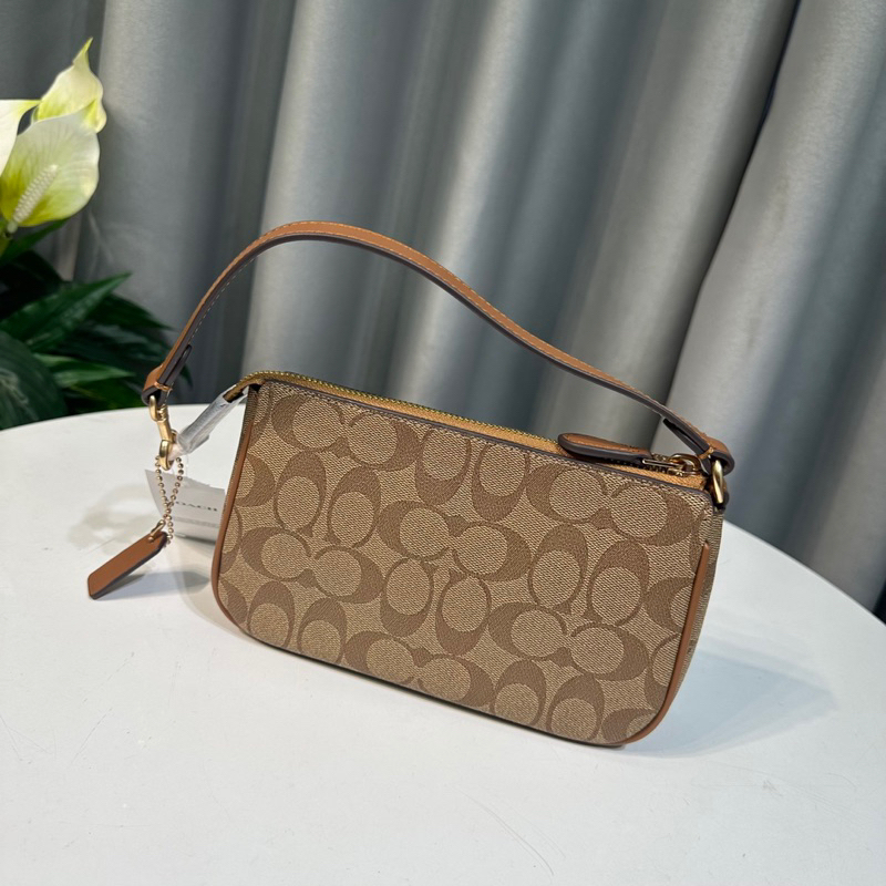 Túi Coach Nolita thuyền kẹp nách xuất chuẩn