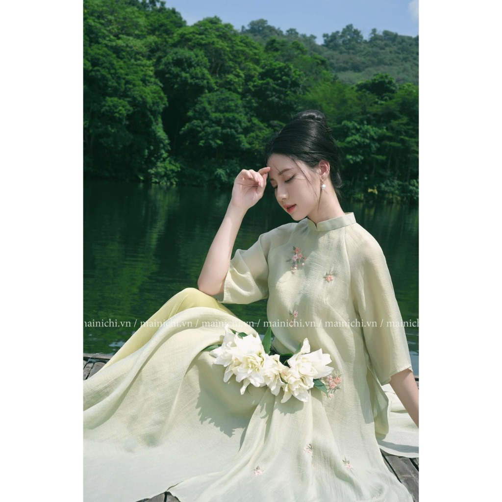 ÁO DÀI THÊU HOA NHÍ MÀU XANH
