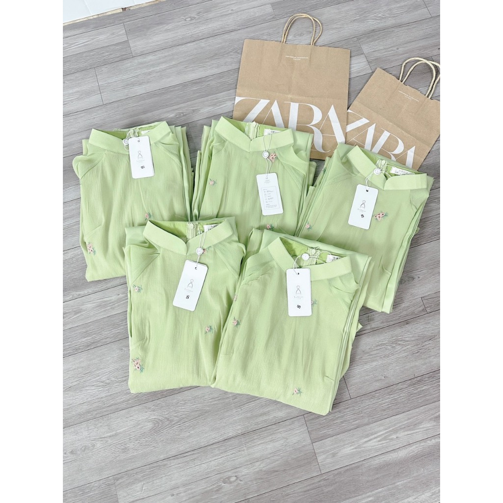 ÁO DÀI THÊU HOA NHÍ MÀU XANH