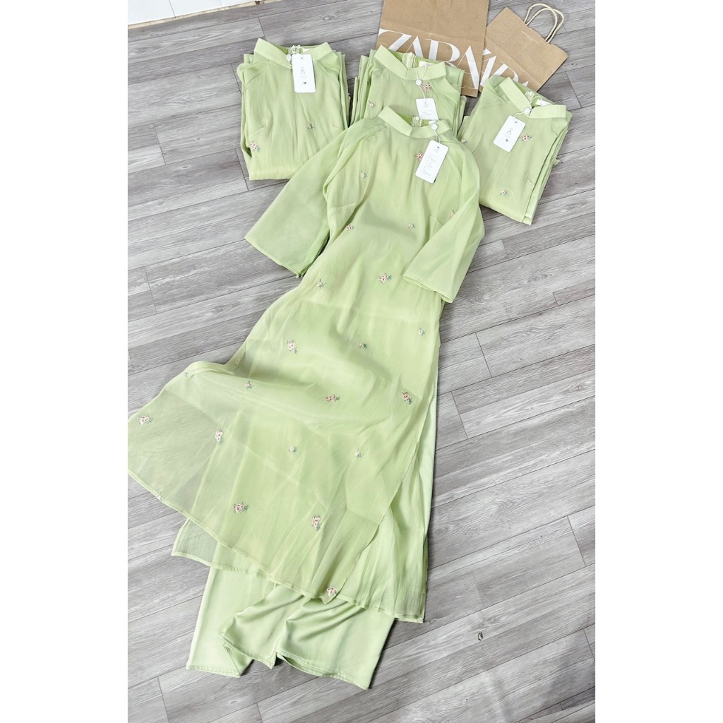 ÁO DÀI THÊU HOA NHÍ MÀU XANH