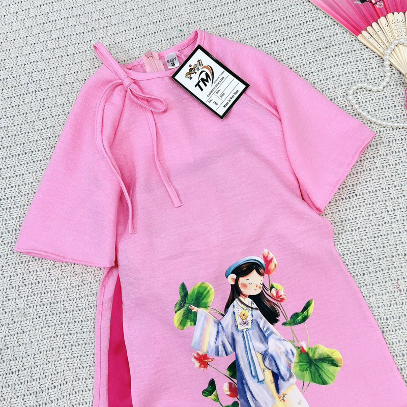 Áo dài cô cám buộc vai bé gái