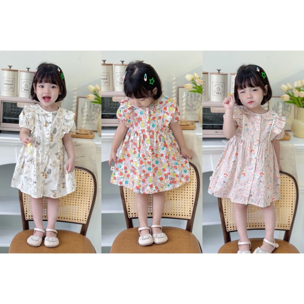 Váy cộc tay cổ tròn, viền bèo vai, tay phồng Mozi cho bé