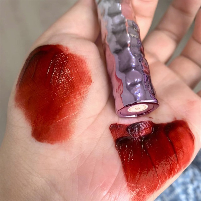 Son môi bóng nội địa vỏ tím mềm mịn môi hot trend HR555