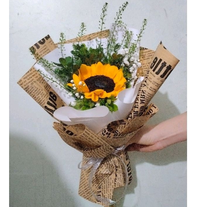 Bó hoa hướng dương nhỏ 1 bông kết hợp với cỏ đồng tiền dễ thương