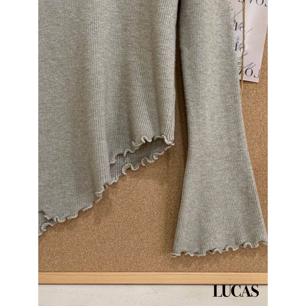 Áo len trễ vai ngang tay dài vạt chéo viền lượn