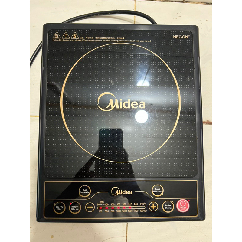 Thanh lý bếp từ Midea phím bấm còn mới mặt kính bị nứt như hình