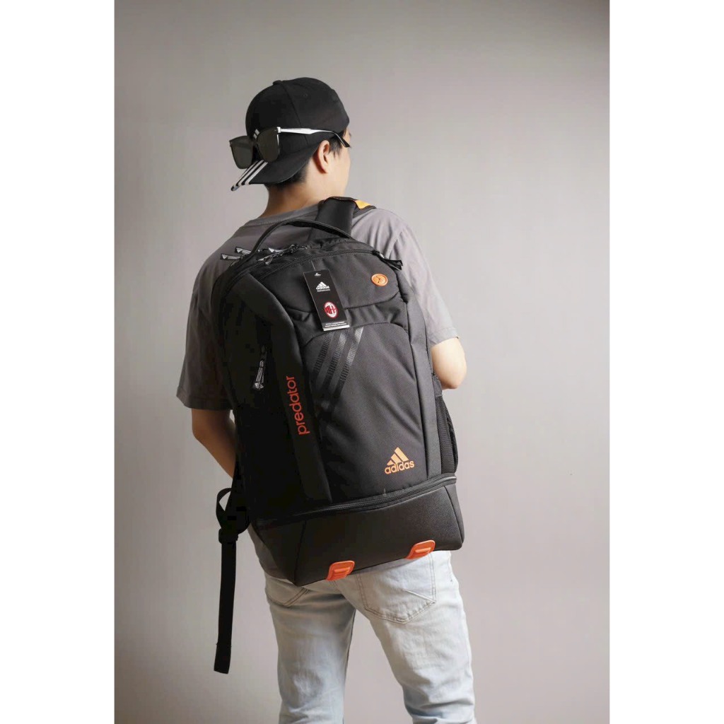 Balo thể thao Adidas predator 33L, phối màu đen cam, ngăn để giày riêng, bóng, vợt tenins