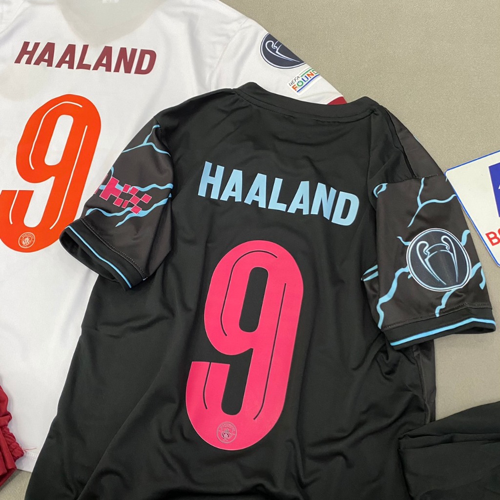 Bộ quần áo Man city sân khách bản cup C1 in tên HAALANd số 9