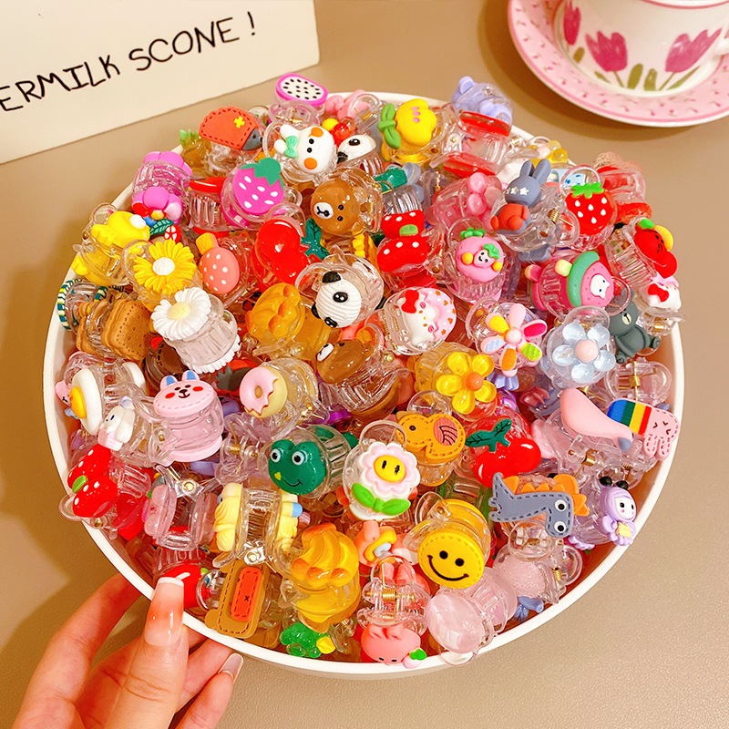 Kẹp tóc cho bé gái chất liệu nhựa phối charm hoạt hình dễ thương đa dạng mẫu mã bé gái nào cũng thích mê