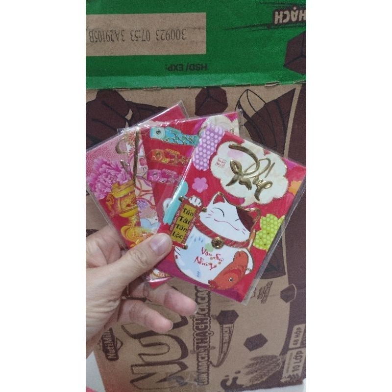 3 xấp bao lì xì hình Tết 2024.