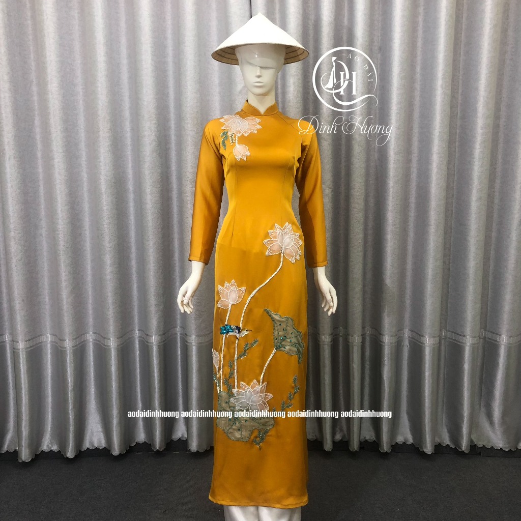 Áo dài thời trang Đinh Hương lụa nữ hoàng 2 tà vàng đồng kết họa tiết sen