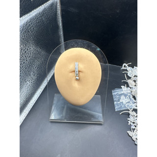 Khuyên rốn bạc ổ kết đá