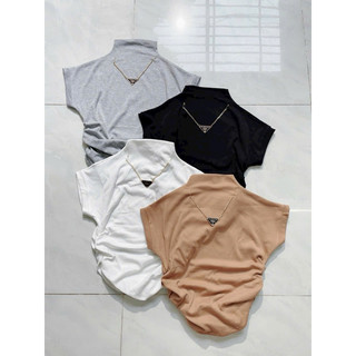 Áo cổ lọ tay ngắn nhún sườn croptop kèm dây xích tam giác