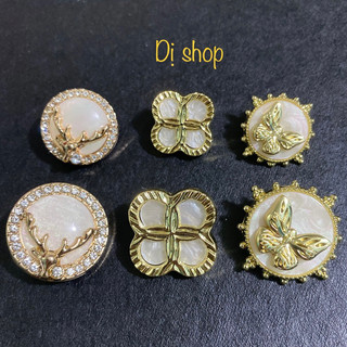 NÚT KIM LOẠI ĐÍNH ĐÁ ( sừng hưu viền đá nhiều size)