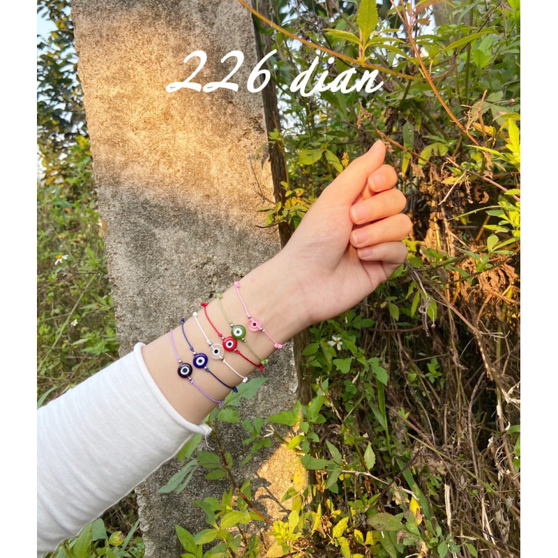 Vòng tay nam, nữ mắt quỷ waterproof