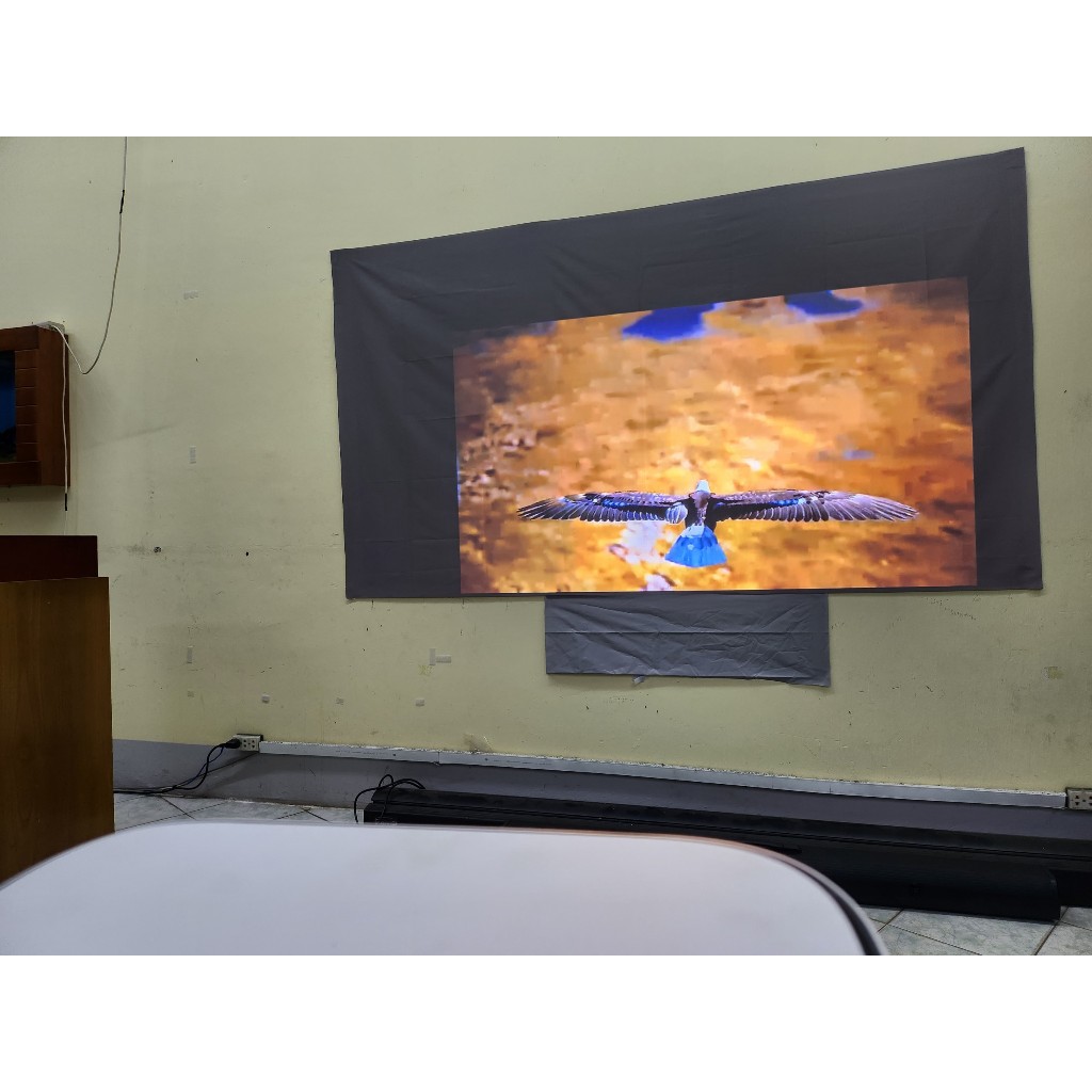 Vải màn chiếu dán tường phản quang tăng độ sáng  cho máy chiếu xa