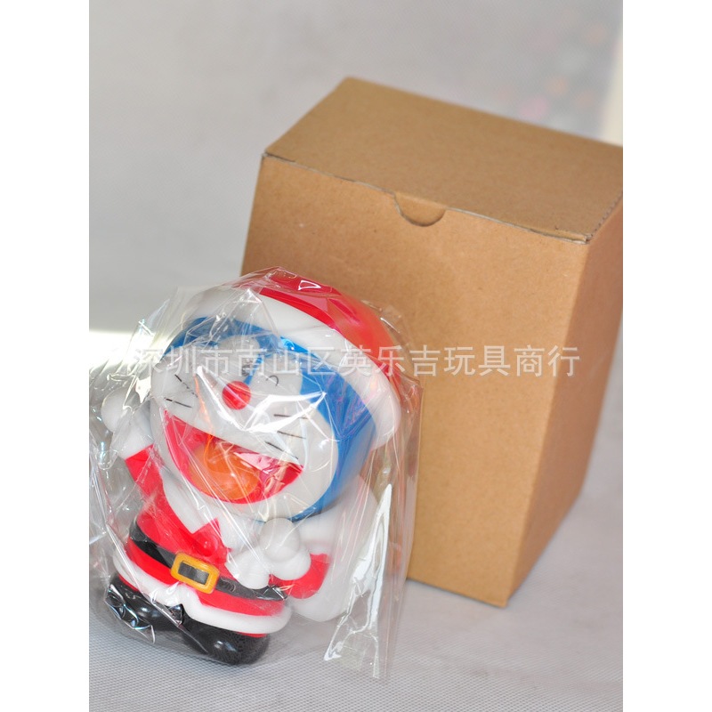 Mô hình Doraemon ông già Noel / Giáng Sinh kèm ống heo mini 15cm