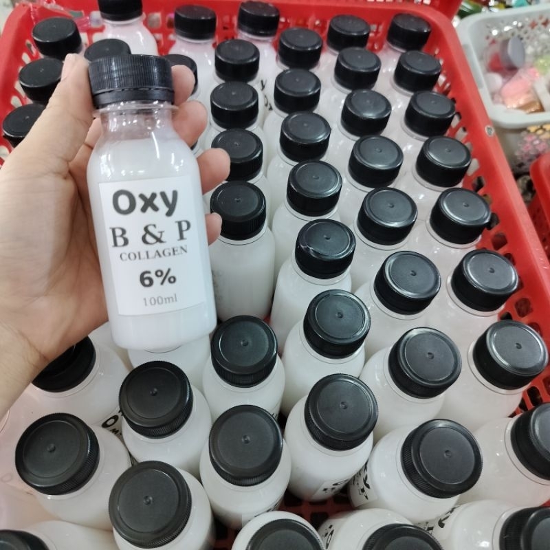 OXY TRỢ NHUỘM TÓC CHAI 100ML KHÔNG RÁT DA ĐẦU MỀM TÓC , LÊN MÀU CHUẨN