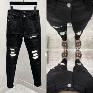 Quần jean bò nam Amiri slimfit đen rách đùi gối vá vải nhăn trắng hình ngôi sao chất dày dặn QJ152P
