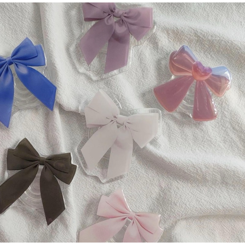 Tay cầm điện thoại hình nơ