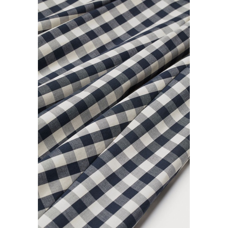 Váy xếp ly ca rô