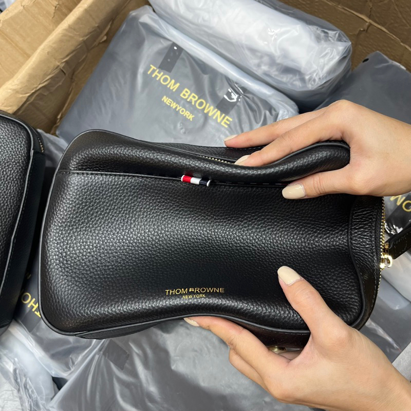 Túi tommy cầm tay nam clutu thom