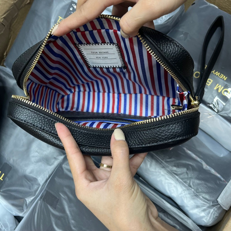 Túi tommy cầm tay nam clutu thom