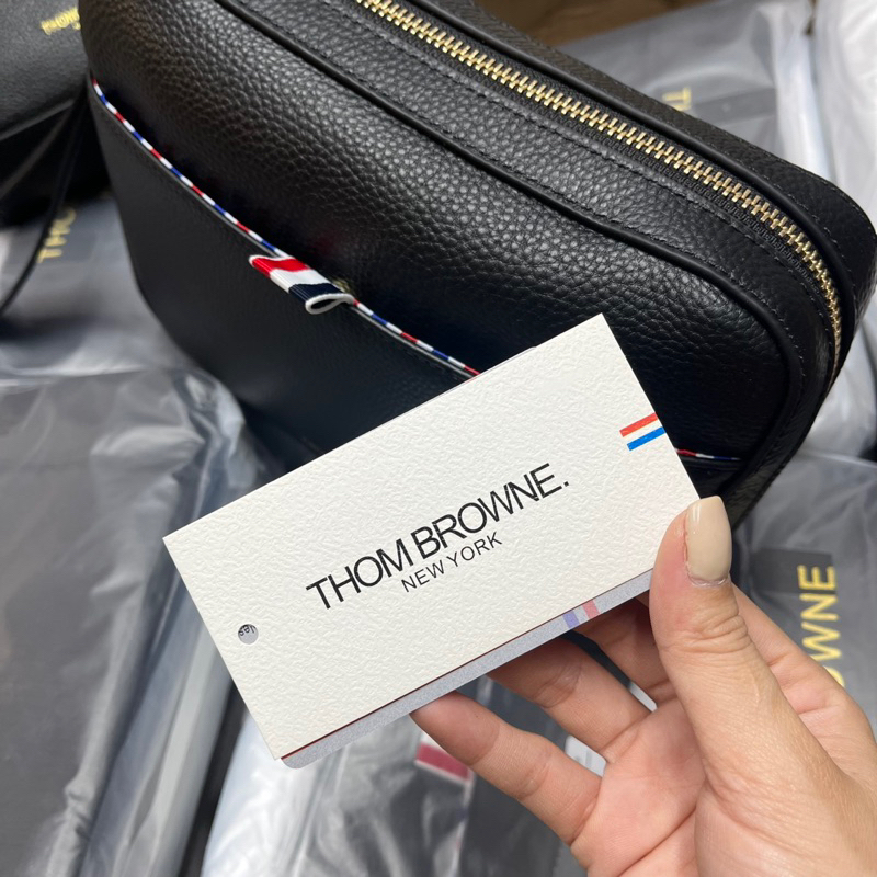 Túi tommy cầm tay nam clutu thom