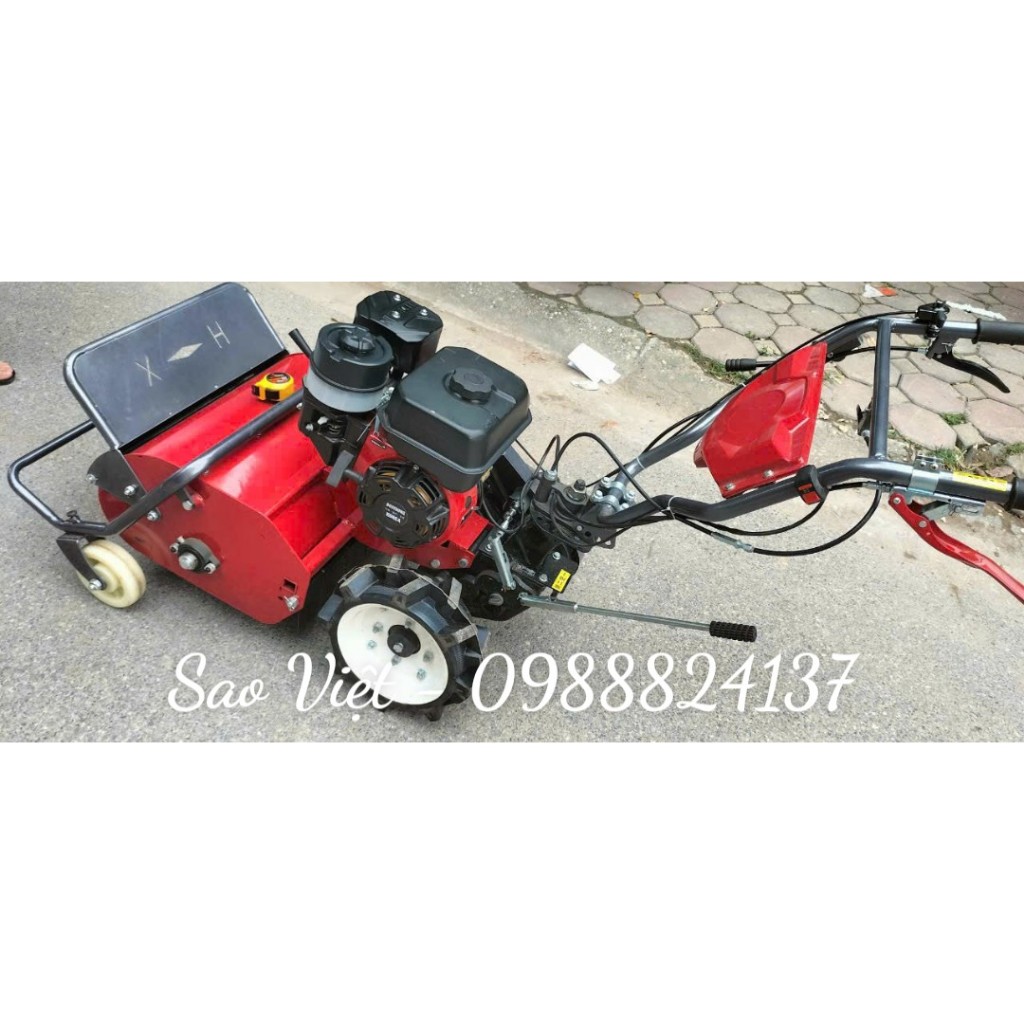 Máy cắt cỏ trục băm đẩy 4 bánh xe chạy xăng 7hp chuyên làm cỏ.