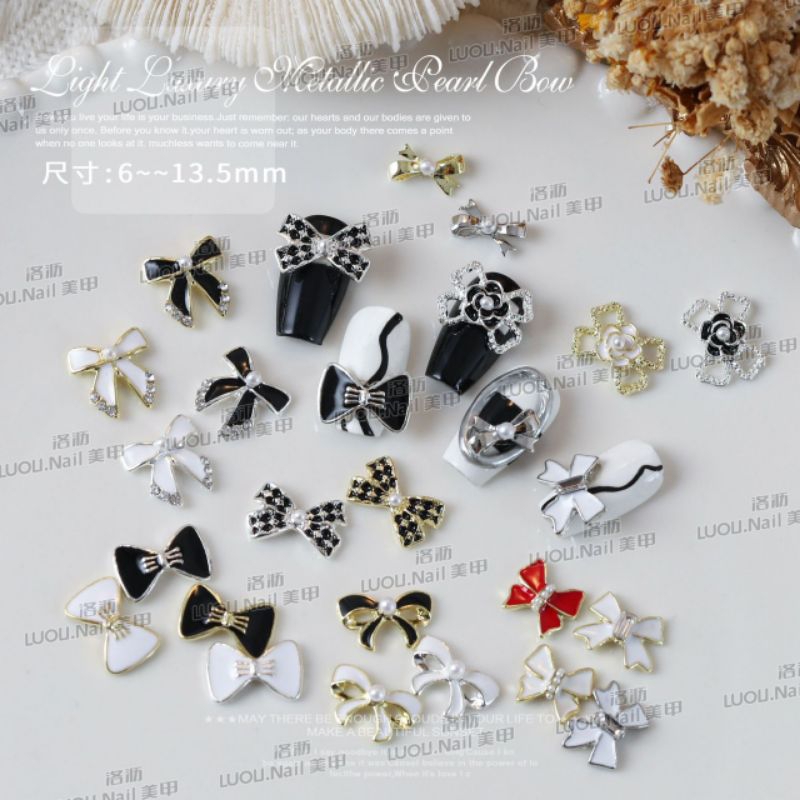 Charm nơ nail bạc sáng
