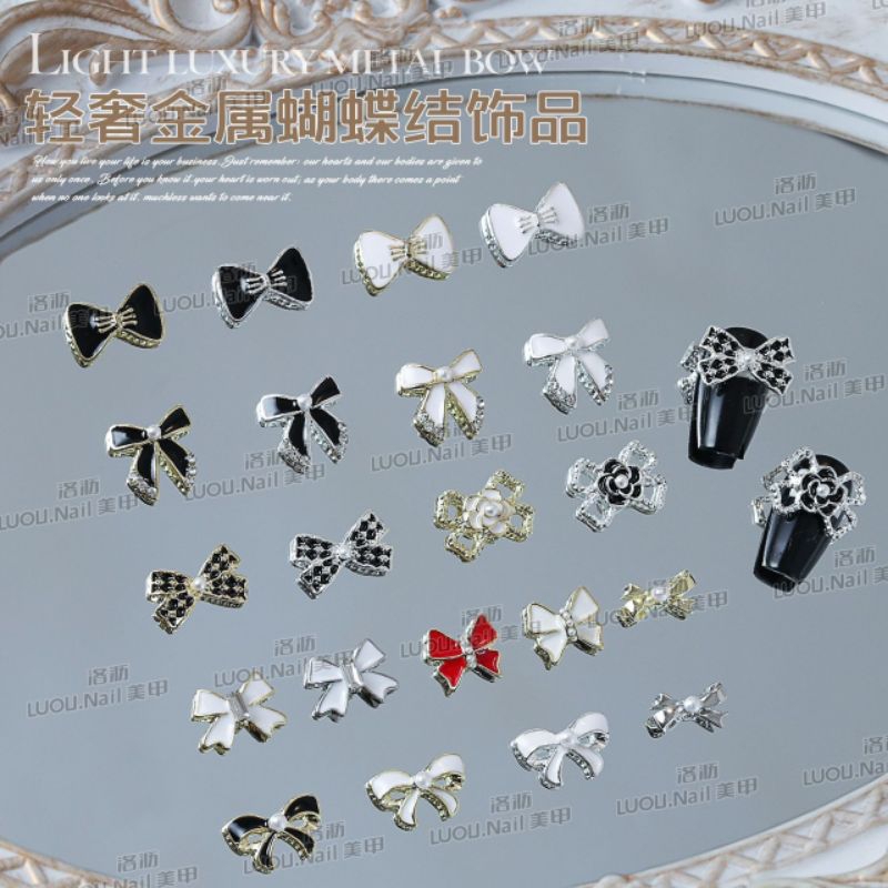 Charm nơ nail bạc sáng