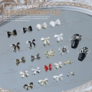 Charm nơ nail bạc sáng