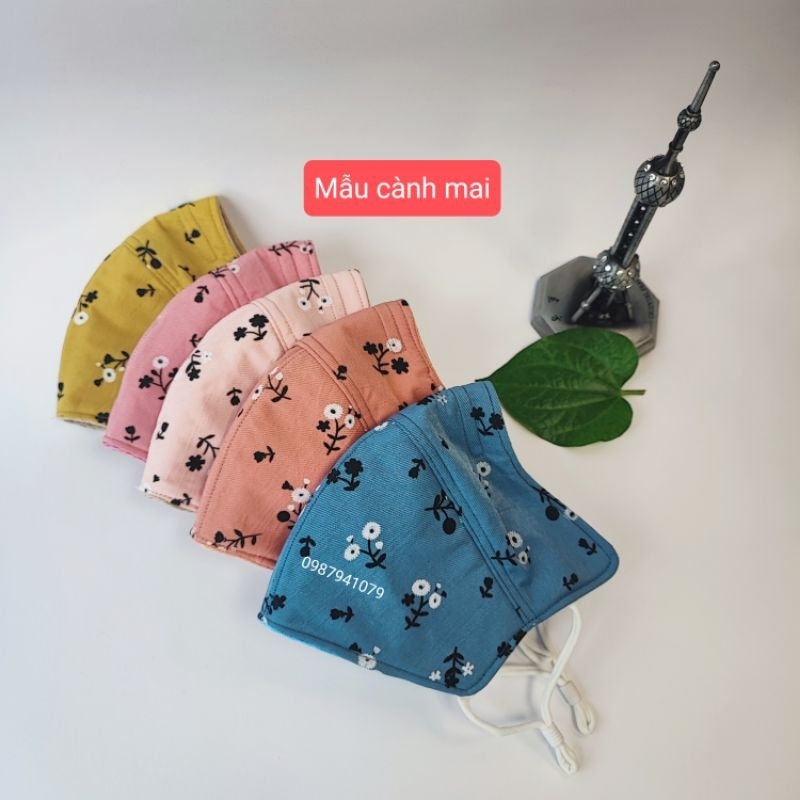 Khẩu trang tai thỏ có kẽm mũi họa tiết bông nhí, có dây rút, nhiều màu