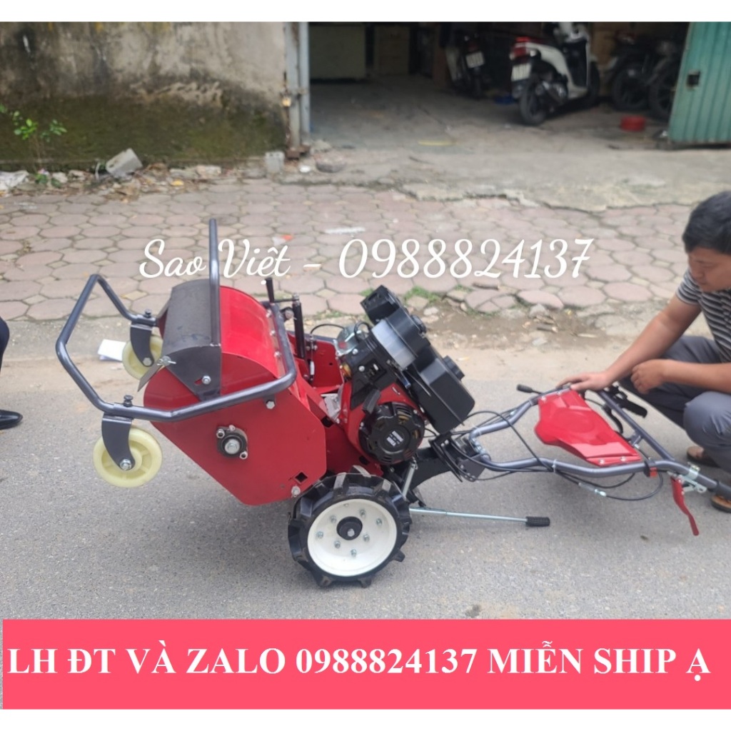 Máy cắt cỏ trục băm đẩy 4 bánh xe chạy xăng 7hp chuyên làm cỏ.