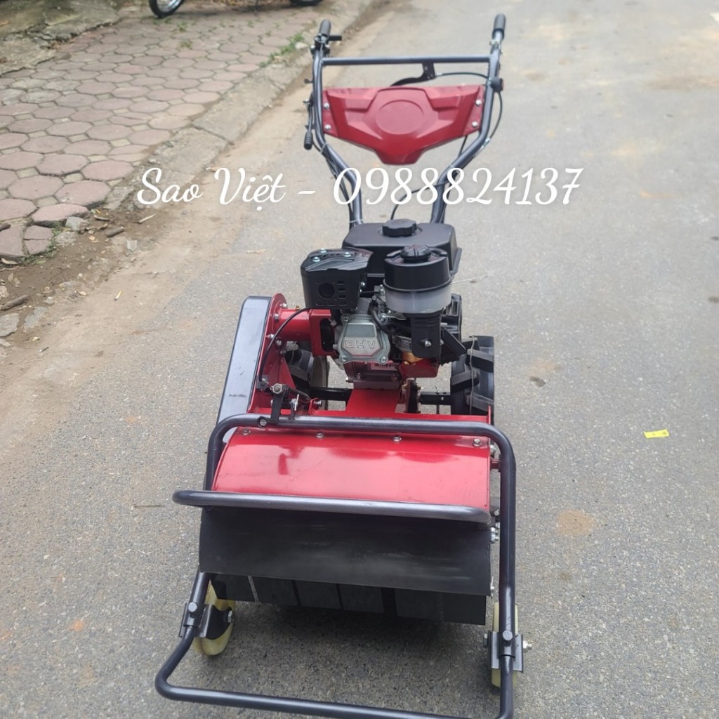 Máy cắt cỏ trục băm đẩy 4 bánh xe chạy xăng 7hp chuyên làm cỏ.