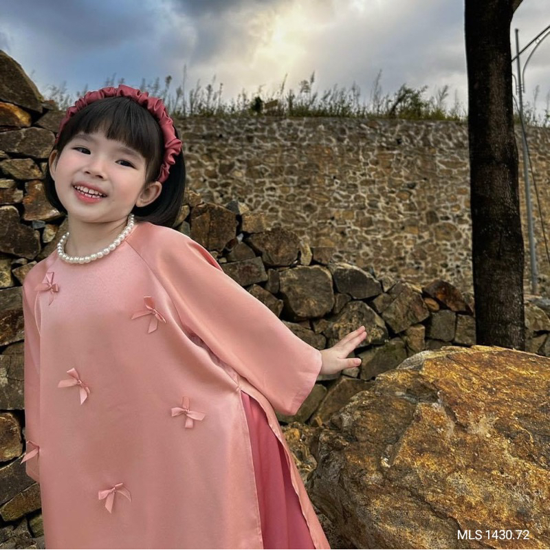 Áo dài cách tân nơ hồng kèm bờm melisa 13-50kg