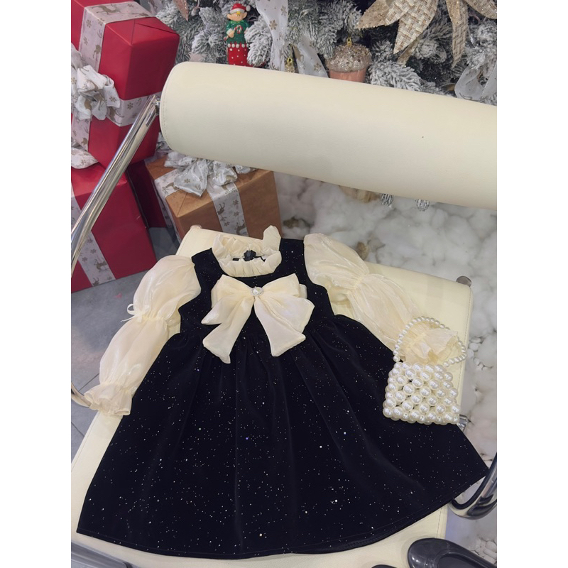 Váy nhung đen nhũ phối tay nơ voan bé gái